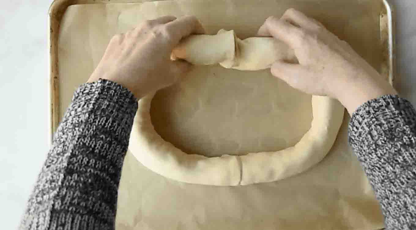 Shaping a sausage roll