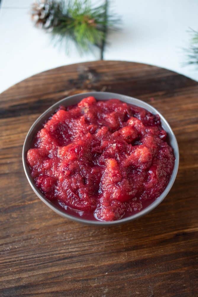 Cranberry apple sauce served in a grey bowl