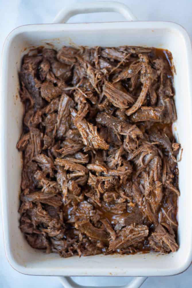 A pan of shredded beef