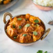Quick and easy chicken madras in a copper serving dish