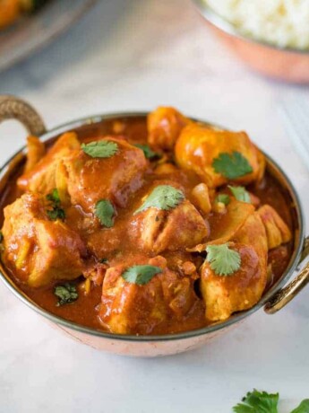 Quick and easy chicken madras in a copper serving dish