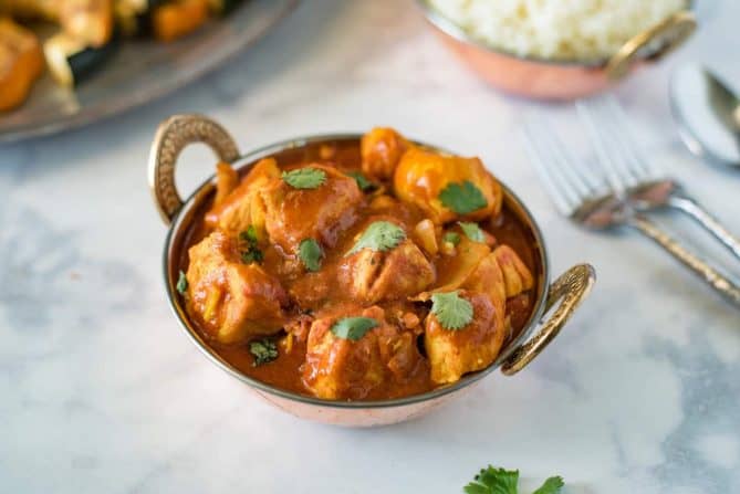 Quick and easy chicken madras in a copper serving dish