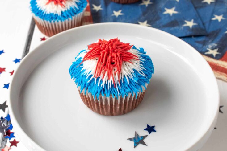 Red white and blue stringed frosting to emulate fireworks