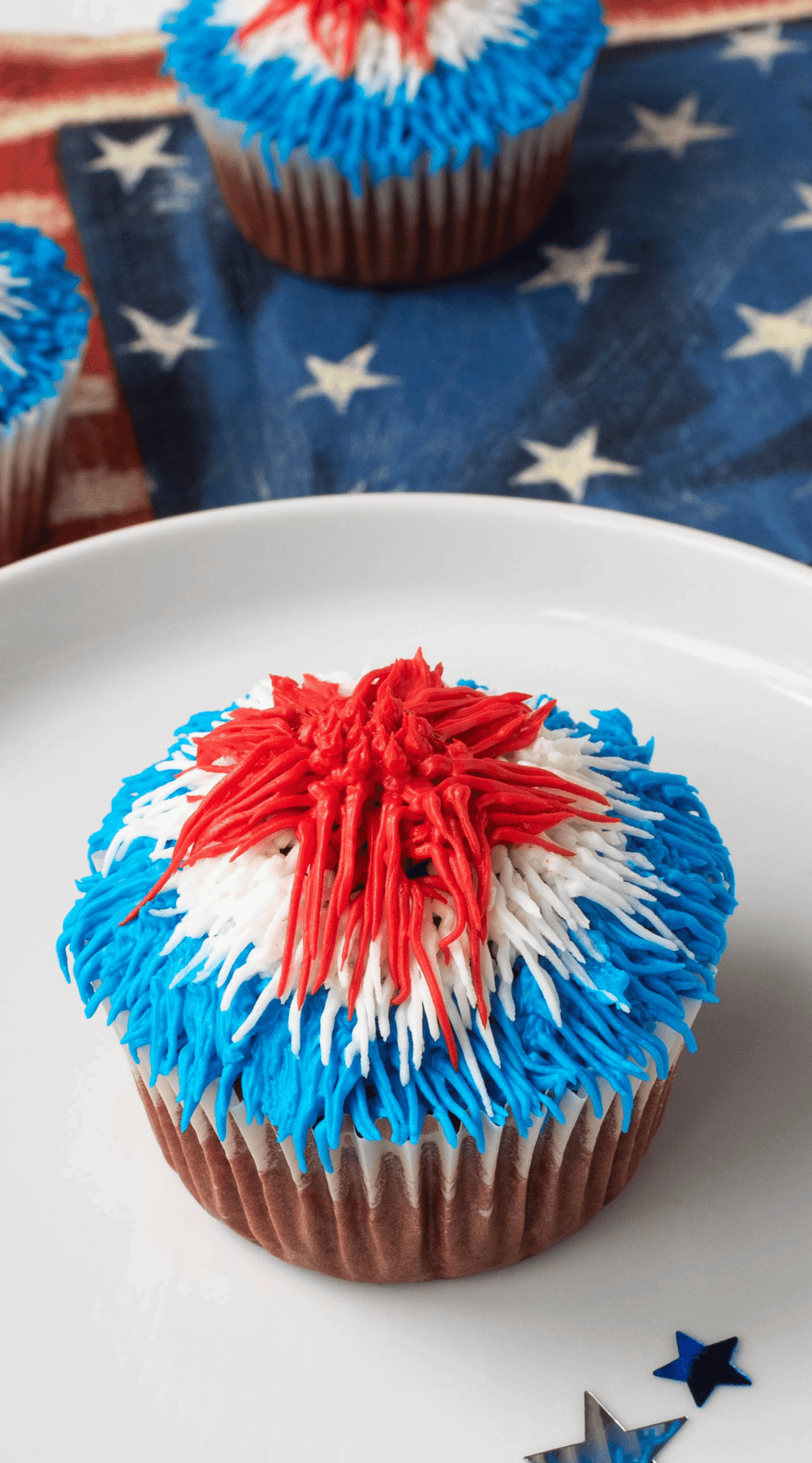 A patriotic color frosted red velvet cupcake