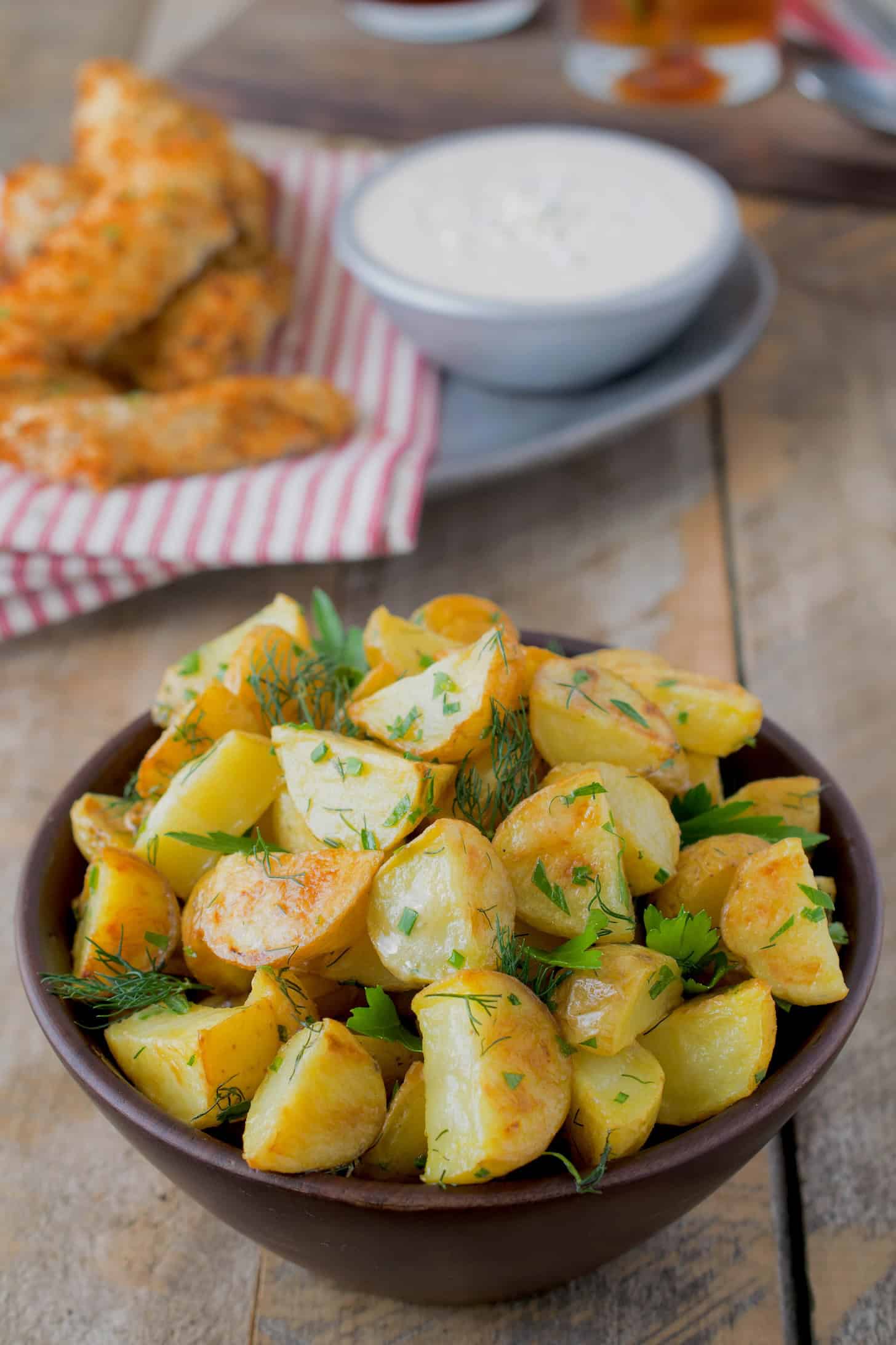 Brown baked potatoes in a bowl