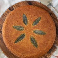 An overhead view of Sage Cornbread garnished with whole sage leaves