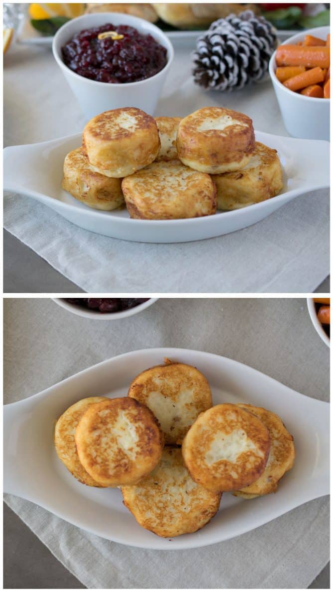 Round potato dumplings in a white serving bowl with cranberry sauce and carrots