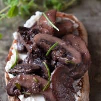 Gorgeous meaty mushrooms on top of crusty bread with creamy ricotta