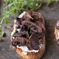 Sautéed mushrooms and rosemary with ricotta cheese on crusty bread