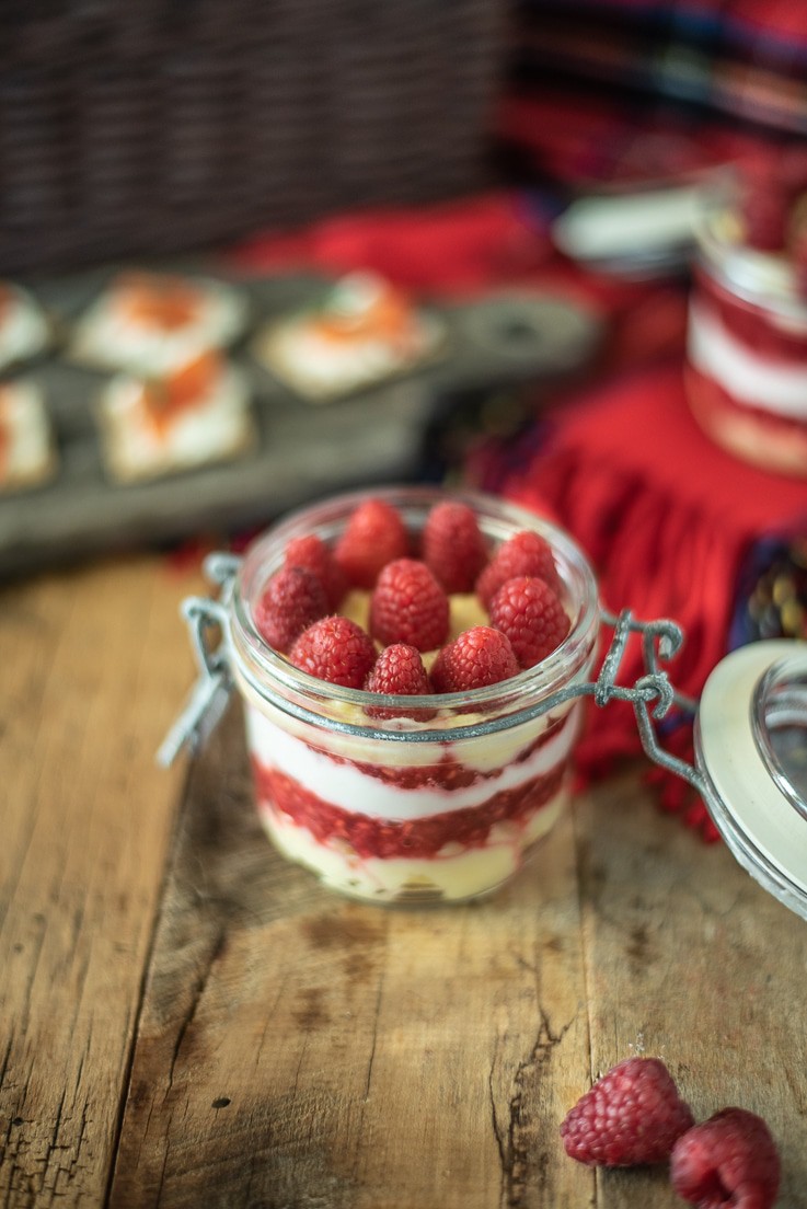 Scottish Raspberry Trifle Dip in a jar topped with fresh raspberries