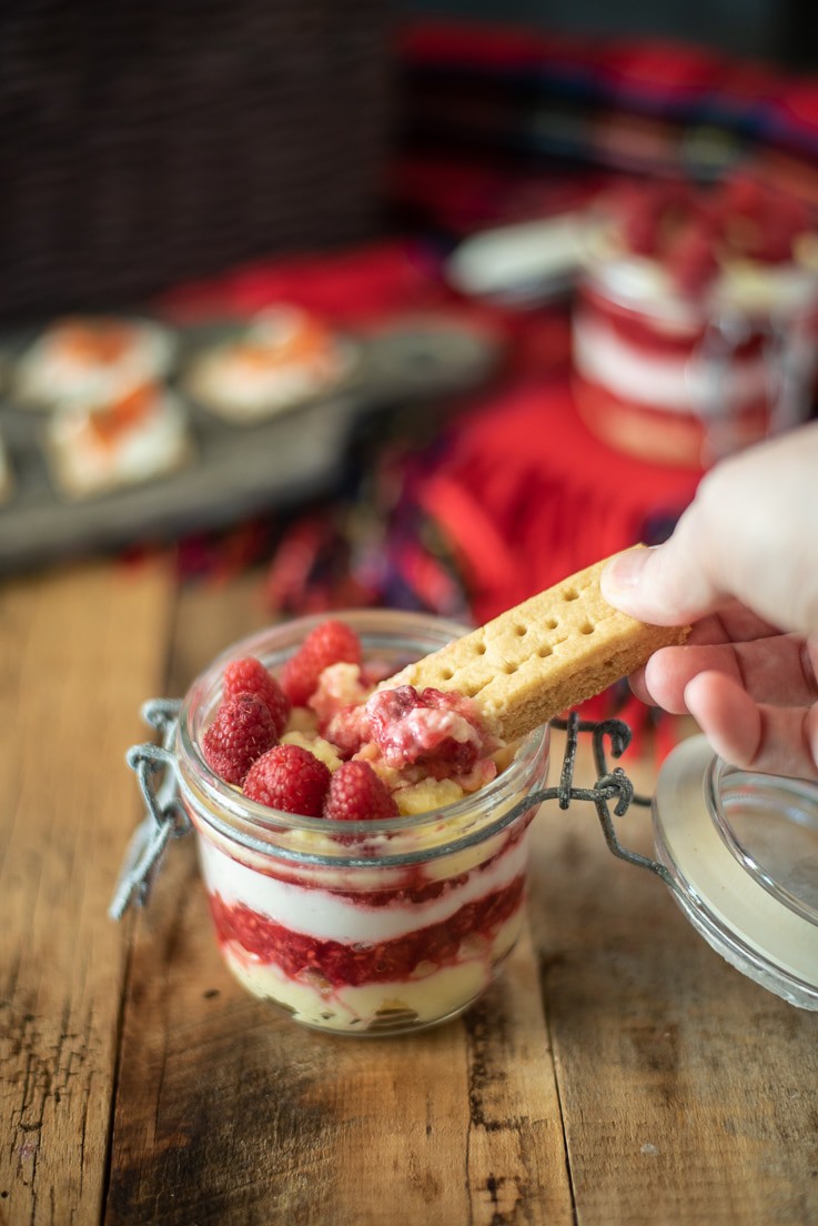Dipping a Walkers shortbread cookie into Scottish Raspberry Trifle Dip
