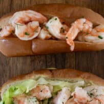 Warm butter poached shrimp in a roll and mayonnaise with shrimp in a roll