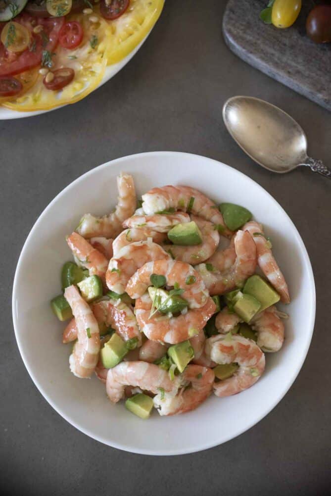 Shrimp and avocado with citrus ginger dressing viewed from overhead