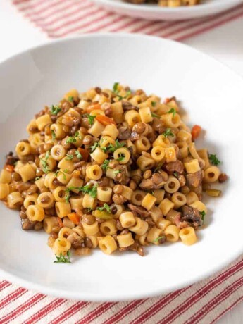 A white bowl filled with Sicilian Lentil Pasta