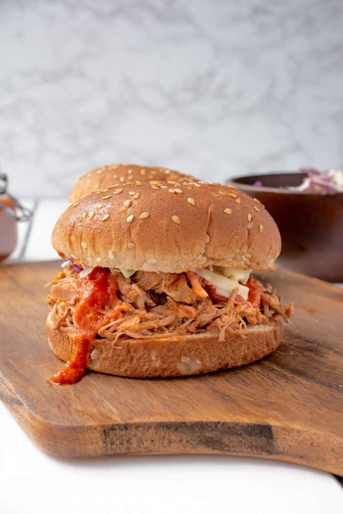 A side view of a pulled pork sandwich