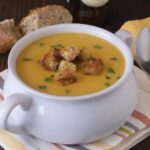 Browned croutons on top of soup
