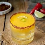 Spicy Jalapeño Mango Margarita with chili peppers and lime