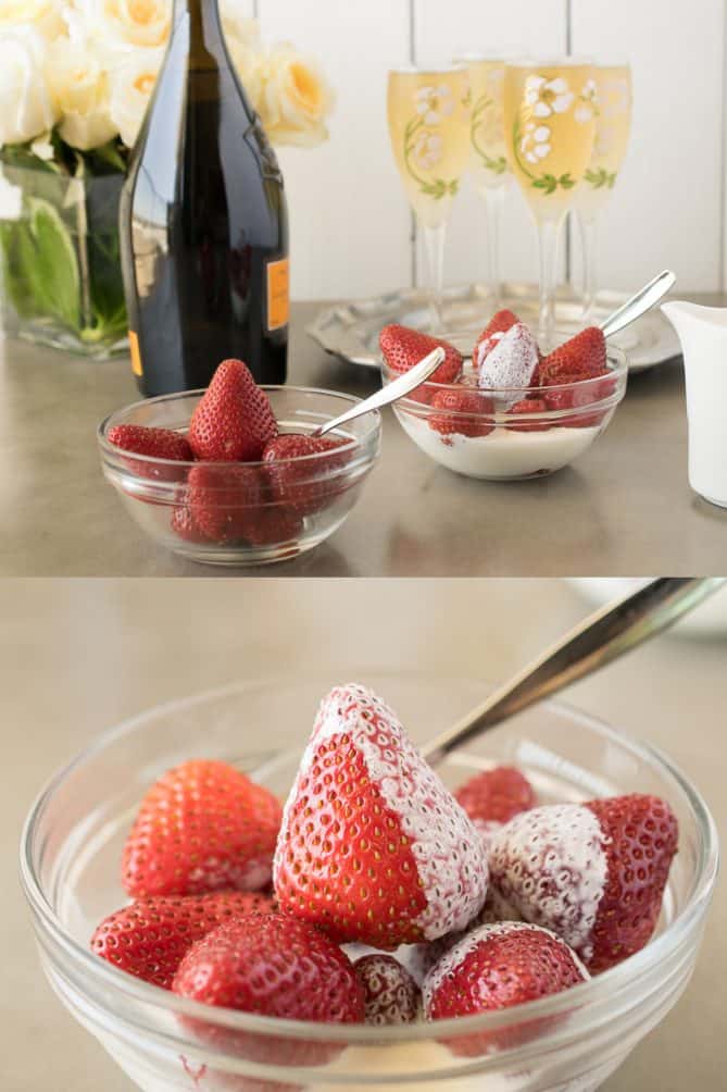 Bowls of strawberries and fresh cream with a closeup