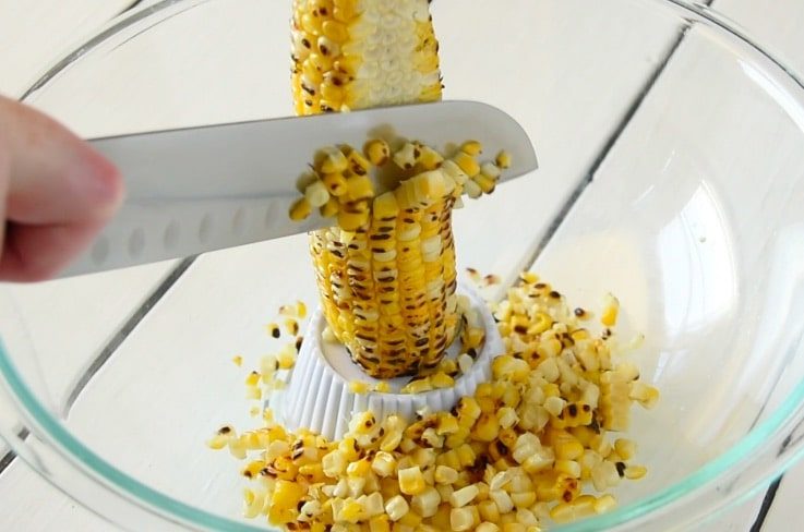 Corn kernels being cut from the cob