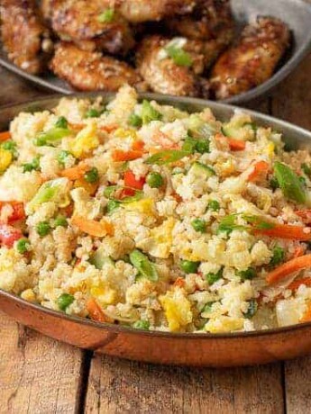 Colorful vegetable fried rice in an oval serving dish