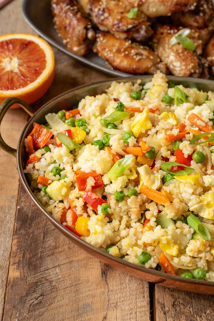 Peppers, carrots, peas and onions in fried rice