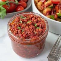 Sun-dried tomato pesto in a glass jar