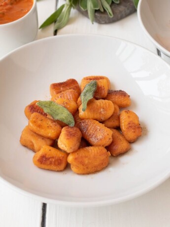 Browned sweet potato gnocchi with crispy sage leaves