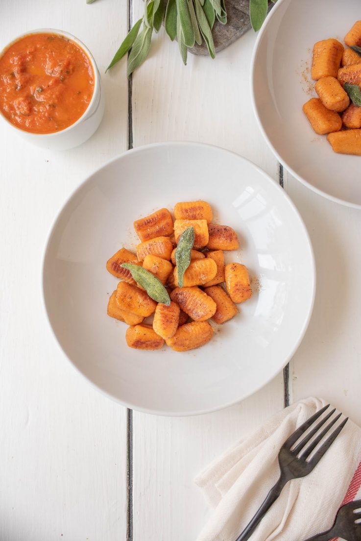 2 bowls of sweet potato gnocchi from overhead