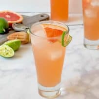 2 glass of tequila Paloma cocktail with fresh lime and grapefruit