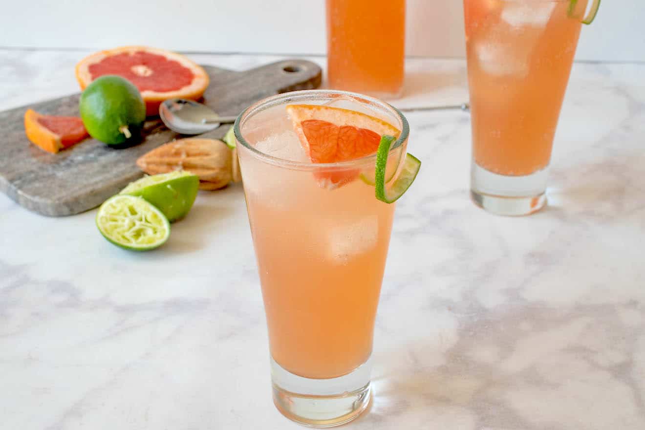 2 glass of tequila Paloma cocktail with fresh lime and grapefruit