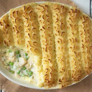 The Easiest British Fish Pie with some mash removed showing the filling