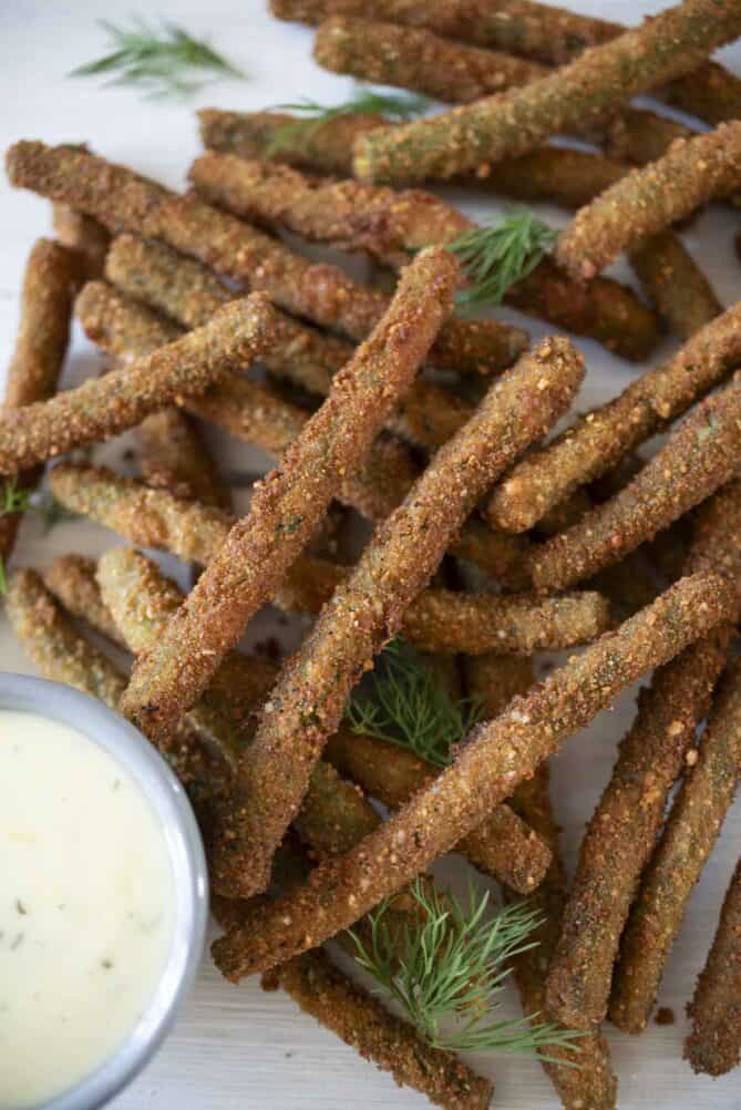 Toasted onion fried green beans in a pile viewed from overhead