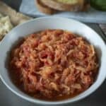 Stewed onions and tomato in a bowl