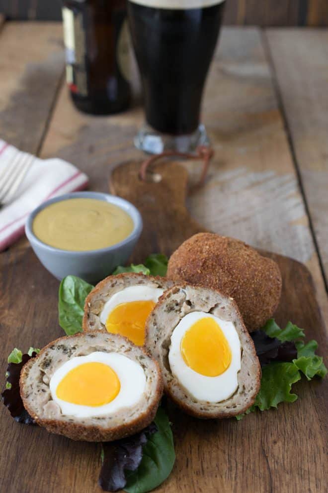 Hard boiled eggs inside scotch eggs wrapped in sausage