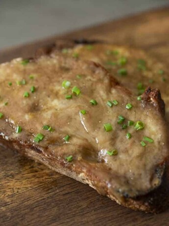 Melted cheese sauce on sliced bread