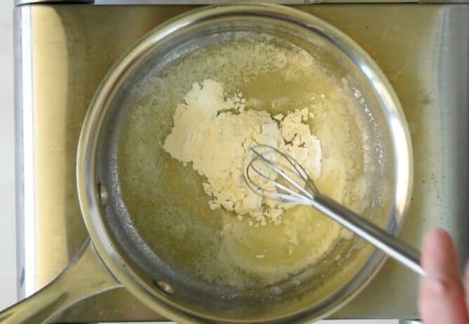 Whisking flour into melted butter