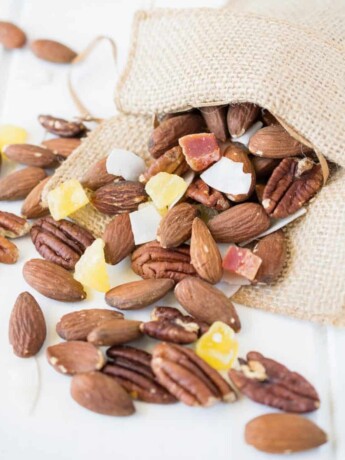 Tropical trail mix. A delicious combination of roasted almonds and pecans, dried mango, pineapple and coconut. This is the perfect anytime snack.