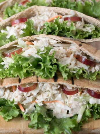 A closeup showing the crisp lettuce, tuna filling and sweet slices of grape