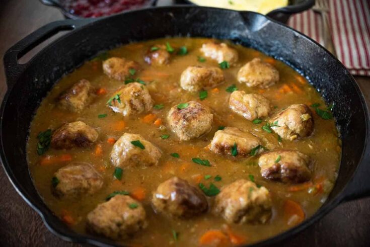 Turkey meatballs cooking in vegetables and gravy
