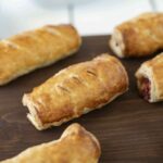 6 sausage rolls on a board
