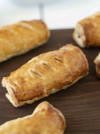 6 sausage rolls on a board