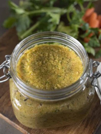 A jar filled with vegetable pureed bouillon