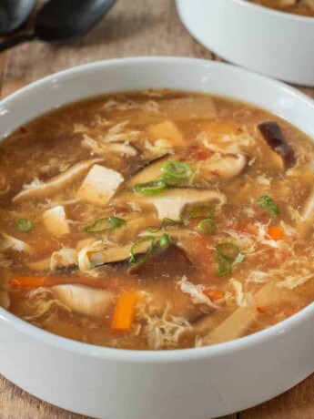 A white bowl filled with vegetarian Chinese hot and sour soup