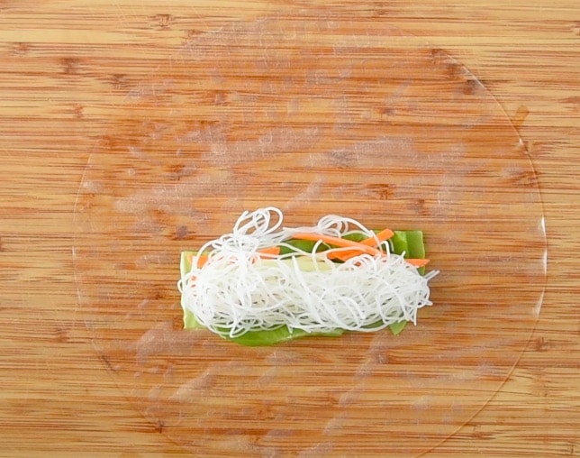 Rice noodles added to the lettuce carrots and cucumber