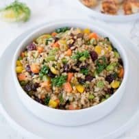 A colorful bowl of vegetable farro