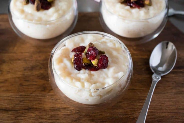 White chocolate rice pudding in a bowl with a spoon
