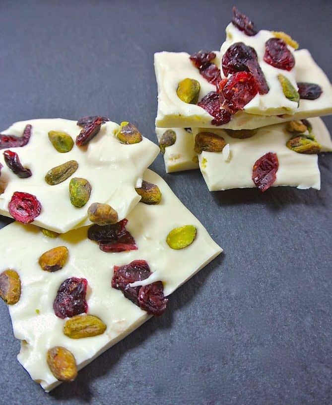 Pieces of white chocolate studded with dried cranberry and roasted pistachio nuts